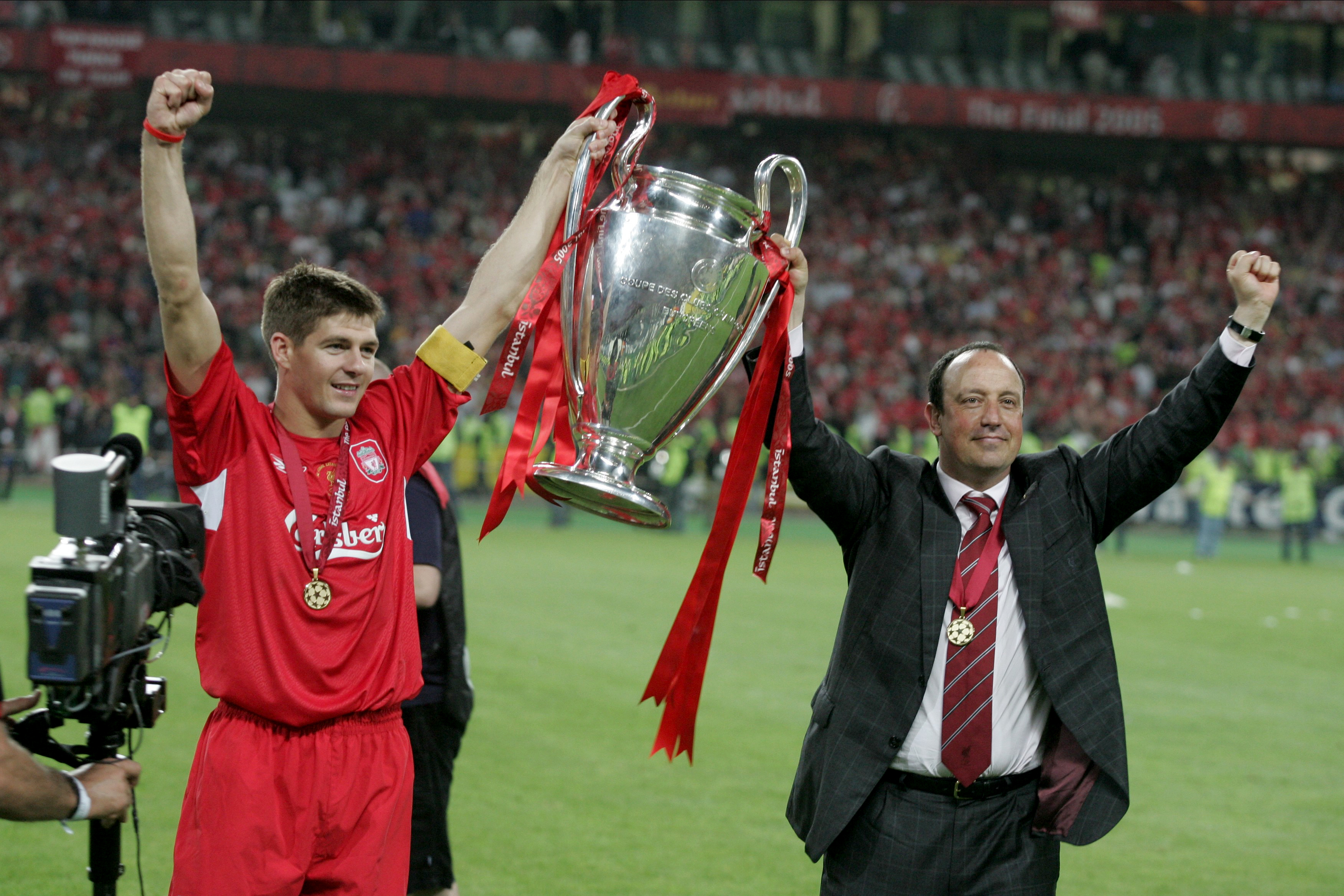 Steven Gerrard and Rafa Benitez hold the Champions League trophy after Liverpool's comeback against AC Milan to win the 2005 final in Istanbul.