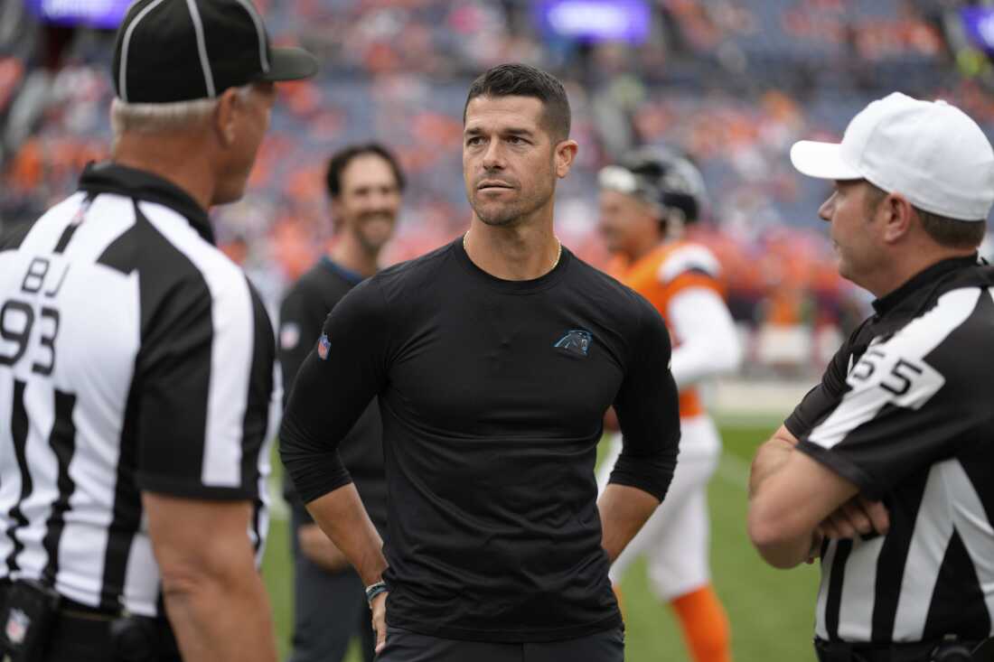 Carolina Panthers head coach Dave Canales talks to referees before an NFL football game against the Denver Broncos Sunday, Oct. 27, 2024, in Denver. (AP Photo/Jack Dempsey)