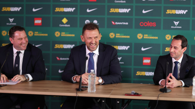 Tony Popovic with Football Australia chief executive James Johnson (left) and chairman Anter Isaac at the Socceroos coach’s appointment in September.