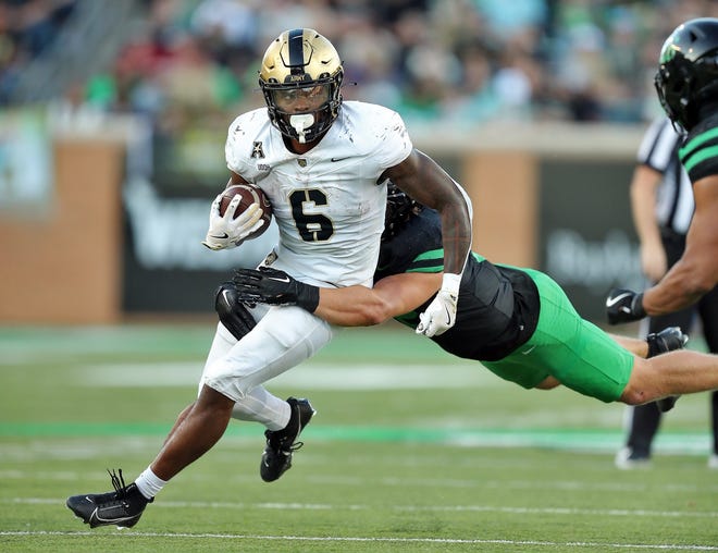 Army running back Kanye Udoh (6) carries the ball against North Texas during the second half at DATCU Stadium in Denton, Texas, on Nov. 9, 2024.