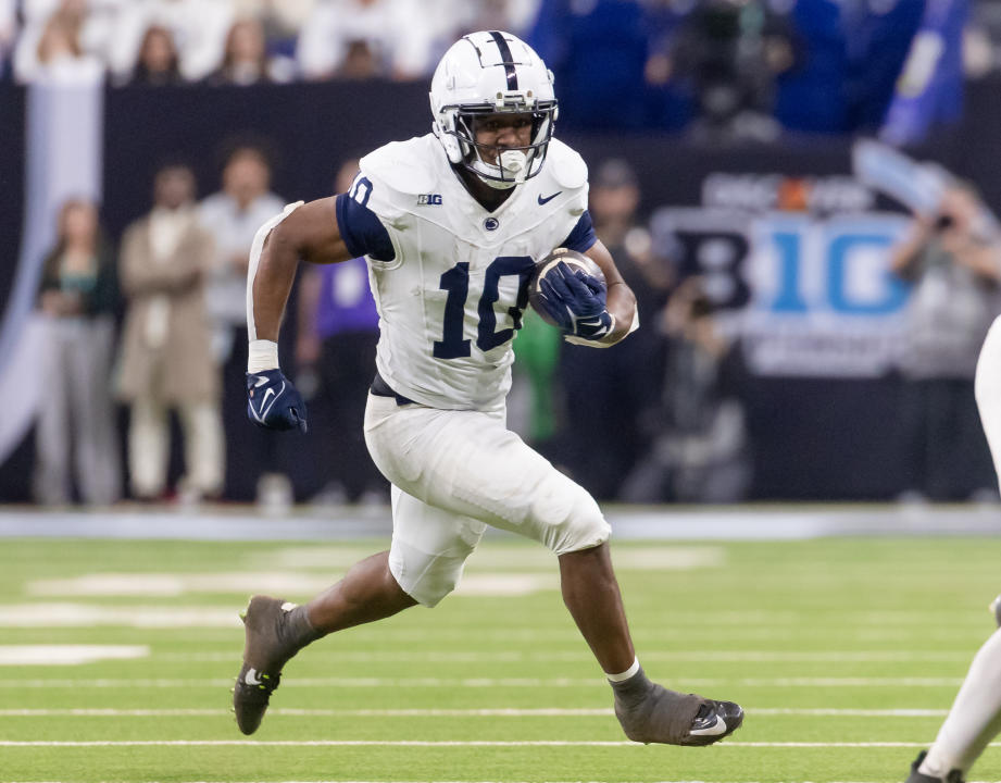 INDIANAPOLIS, INDIANA - DECEMBER 7: Nicholas Singleton #10 of the Penn State Nittany Lions runs the ball against the Oregon Ducks during the Big Ten Championship at Lucas Oil Stadium on December 7, 2024 in Indianapolis, Indiana. (Photo by Michael Hickey/Getty Images)