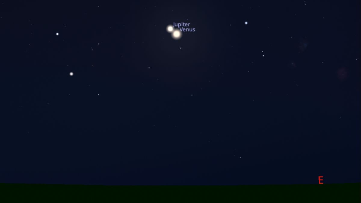 night sky graphic showing jupiter and venus close together against a starry night sky.