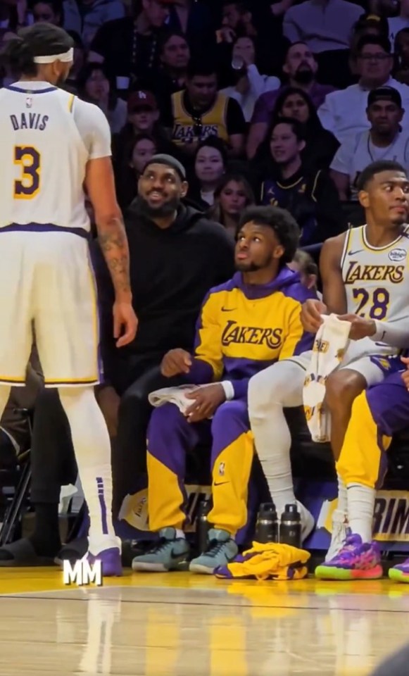 Bronny was sitting next to dad LeBron on the bench vs the Trail Blazers