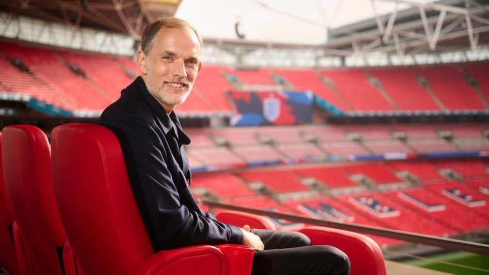 Thomas Tuchel sitting at Wembley