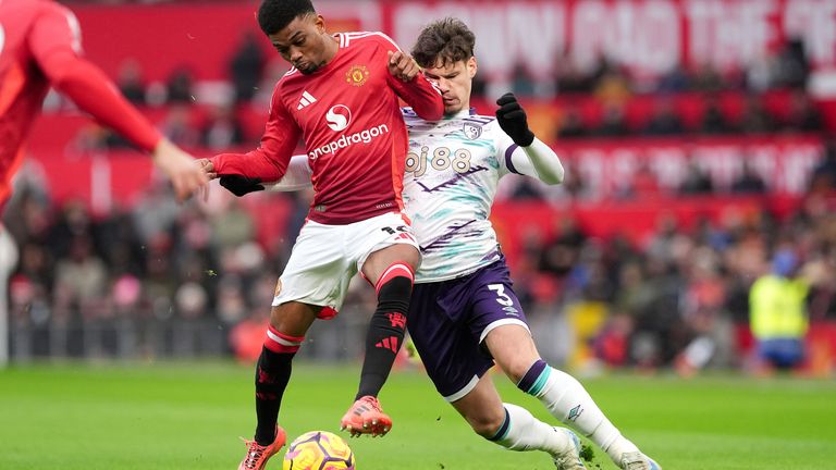 Manchester United's Amad Diallo (left) and Bournemouth's Milos Kerkez battle for the ball