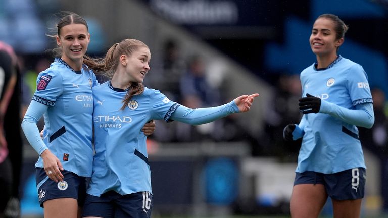 Manchester City's Jess Park (C) celebrates after scoring her sides third goal