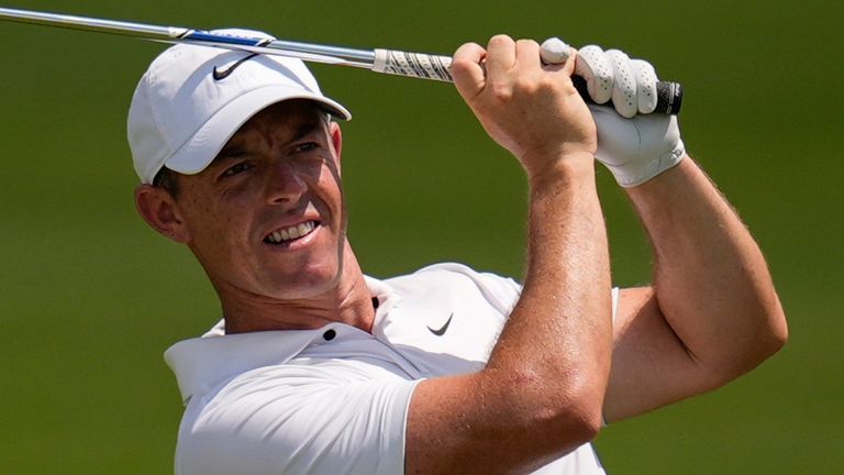 Rory McIlroy, of Northern Ireland, hits out of the seventh fairway during the second round of the Tour Championship golf tournament, Friday, Aug. 30, 2024, in Atlanta. (AP Photo/Mike Stewart) 