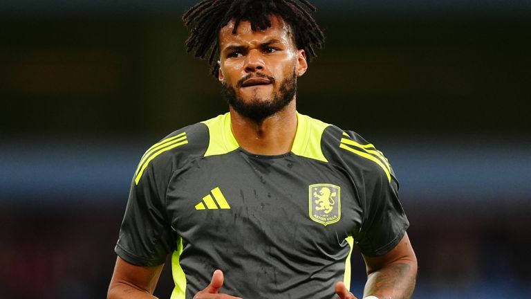 Tyrone Mings warms up ahead of kick-off at Villa Park