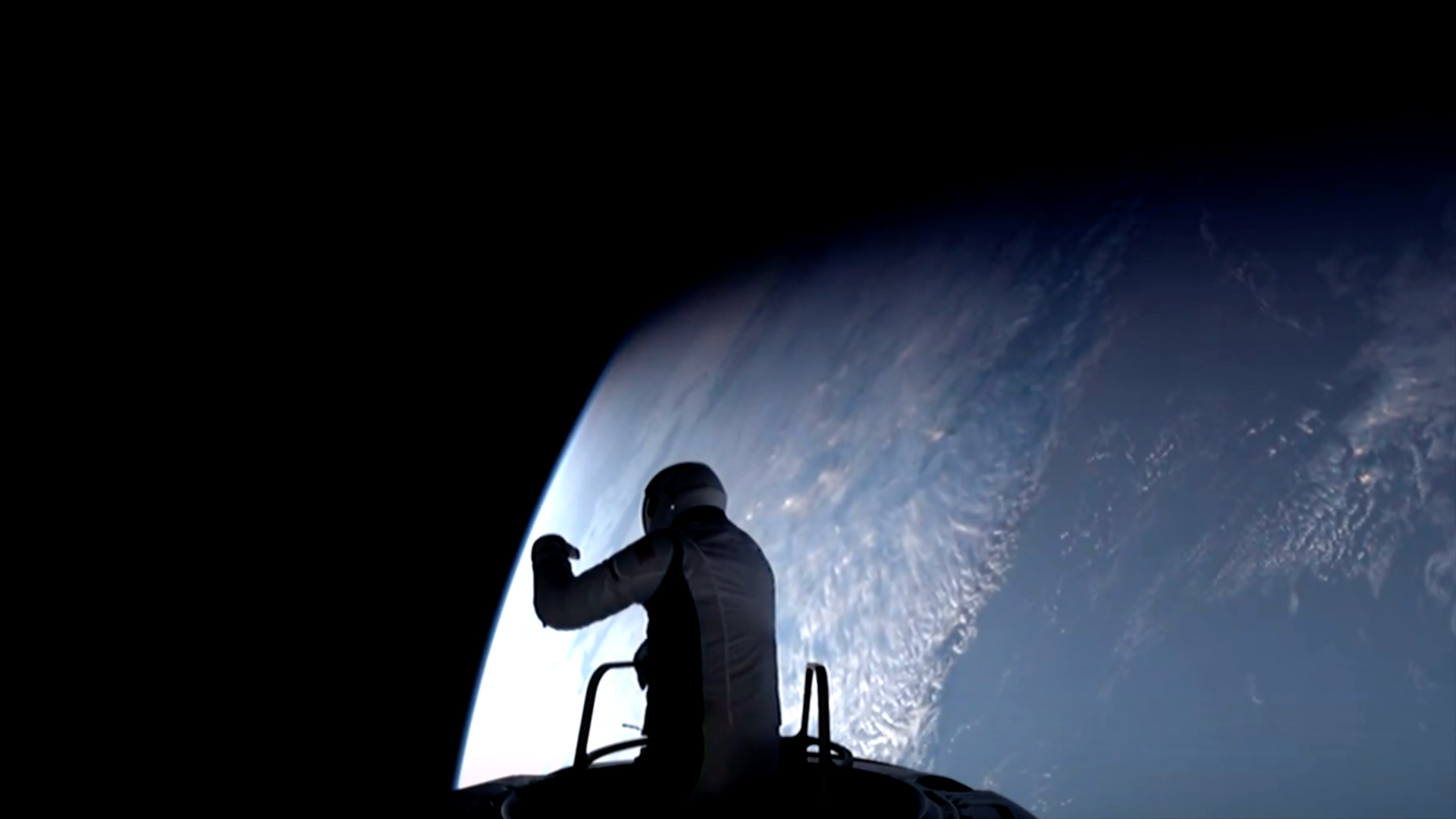 an astronaut in a white spacesuit is halfway out of a space capsule in oribt, silhouetted against earth in the background