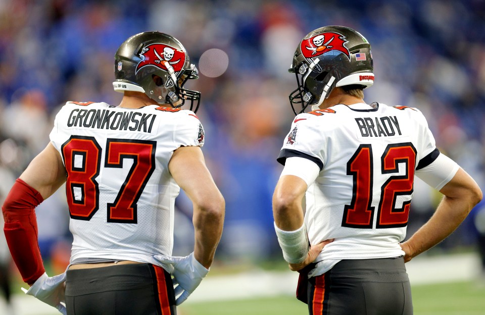 Tom Brady and Rob Gronkowski of the Tampa Bay Buccaneers talking before a game.