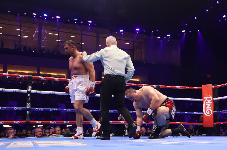 RIYADH, SAUDI ARABIA - FEBRUARY 22: Agit Kabayel knocks down Zhilei Zhang which later resutls in a stoppage during the WBC Interim World Heavyweight Title fight between Zhilei Zhang and Agit Kabayel as part of Beterbiev v Bivol 2: The Last Crescendo at Kingdom Arena on February 22, 2025 in Riyadh, Saudi Arabia. (Photo by Richard Pelham/Getty Images)