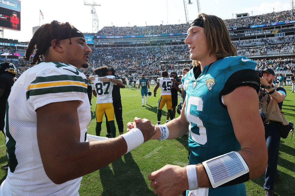 Trevor Lawrence of the Jacksonville Jaguars and Jordan Love of the Green Bay Packers shaking hands after a game.