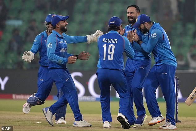 Afghanistan held their nerve to beat England by eight runs in Lahore on Wednesday