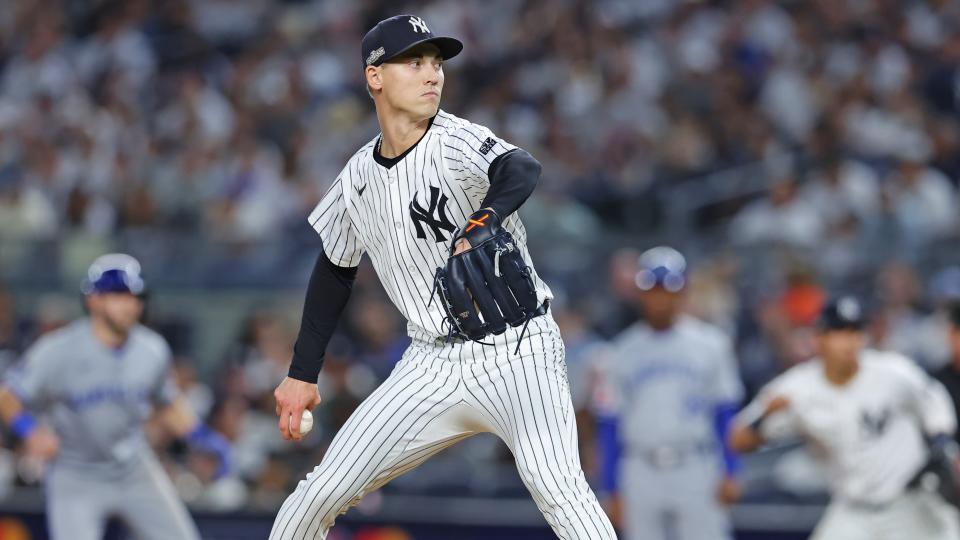 New York Yankees pitcher Luke Weaver (30) pitches against the Kansas City Royals during the eighth inning during game one of the ALDS for the 2024 MLB Playoffs at Yankee Stadium