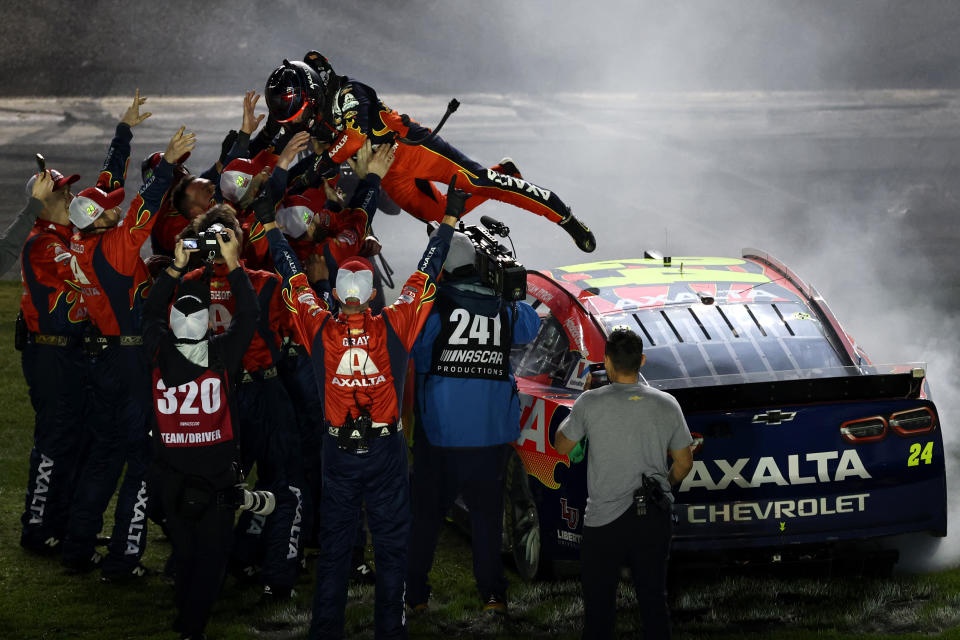 DAYTONA BEACH, FLORIDA - FEBRUARY 16: William Byron, driver of the #24 Axalta Chevrolet celebrates with his crew after winning  the NASCAR Cup Series Daytona 500 at Daytona International Speedway on February 16, 2025 in Daytona Beach, Florida. (Photo by Jared C. Tilton/Getty Images)