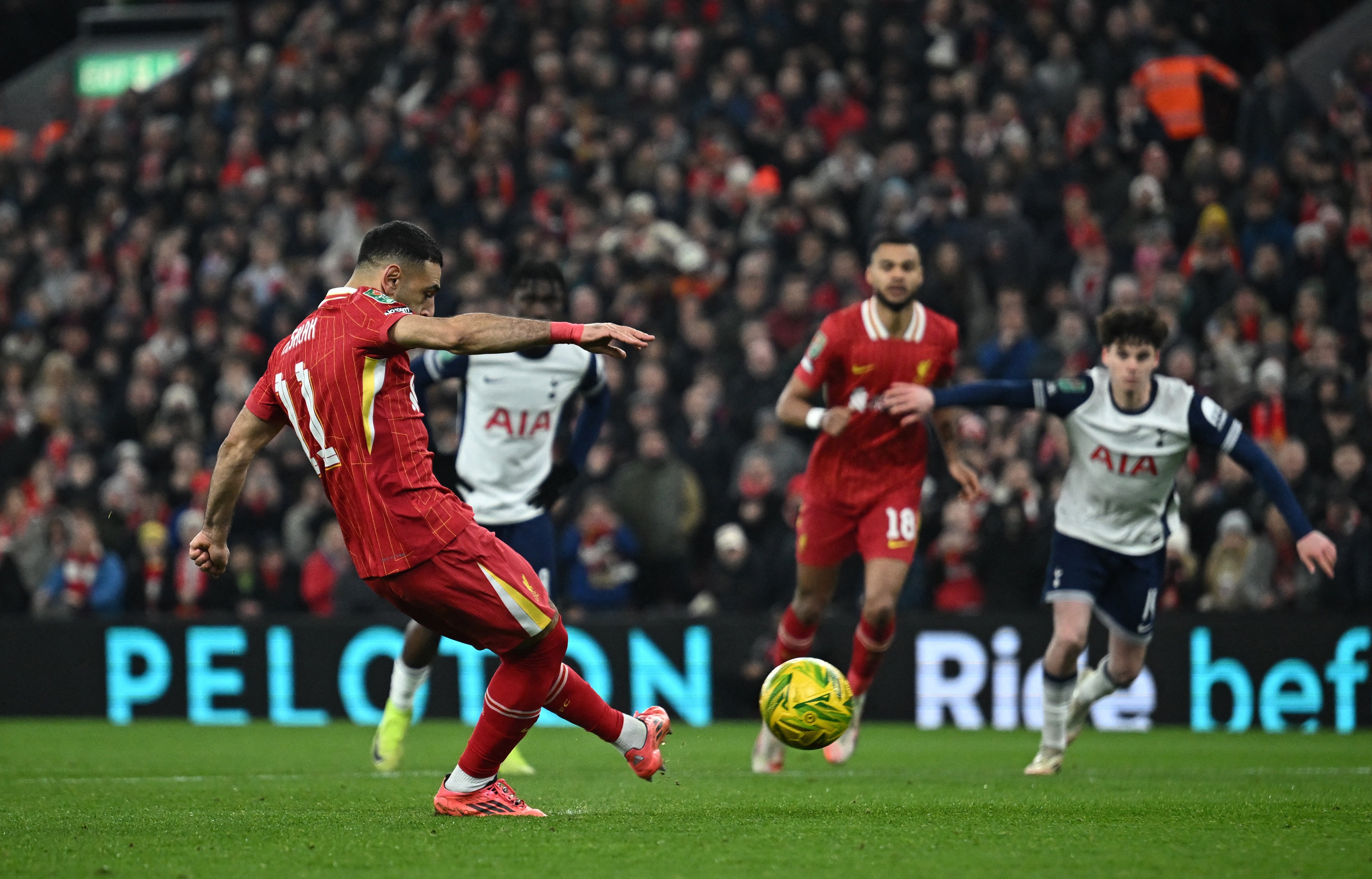 Mo Salah converted from the penalty spot to give Liverpool the lead in this tie