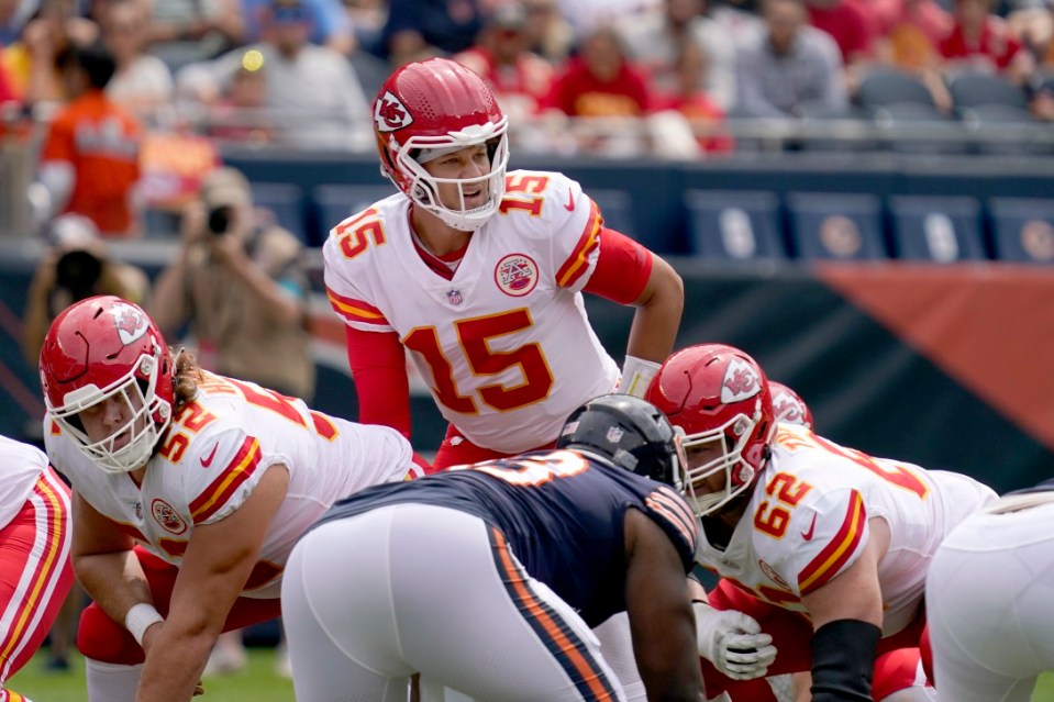 Kansas City Chiefs quarterback Patrick Mahomes looks down the line of scrimmage during the first half of an NFL preseason football game against the Chicago Bears Saturday, Aug. 13, 2022, in Chicago. (AP Photo/Nam Y. Huh)