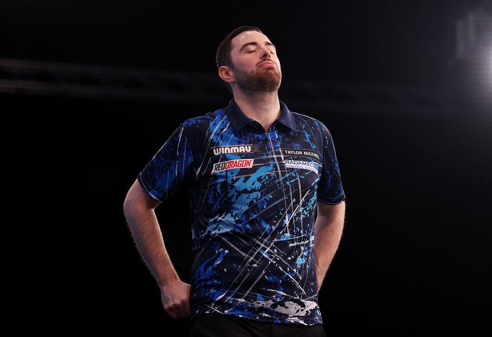 MILTON KEYNES, ENGLAND - FEBRUARY 02: Luke Humphries of England reacts to winning the final of the 2025 Winmau World Masters at Marshall Arena on February 02, 2025 in Milton Keynes, England. (Photo by Harry Murphy/Getty Images)