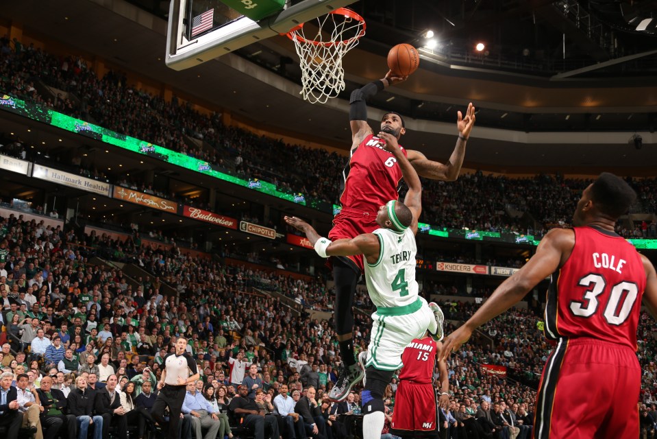 BOSTON, MA - MARCH 18: LeBron James #6 of the Miami Heat dunks on an alley-oop pass against Jason Terry #4 of the Boston Celtics on March 18, 2013 at TD Garden in Boston, Massachusetts.  NOTE TO USER: User expressly acknowledges and agrees that, by downloading and or using this photograph, User is consenting to the terms and conditions of the Getty Images License Agreement. Mandatory Copyright Notice: Copyright 2013 NBAE  (Photo by Nathaniel S. Butler/NBAE via Getty Images)