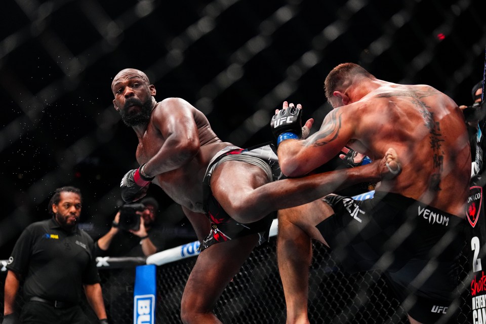 NEW YORK, NEW YORK - NOVEMBER 16: (L-R) Jon Jones of the United States of America kicks Stipe Miocic of the United States of America in the UFC light heavyweight championship fight during the UFC 309 event at Madison Square Garden on November 16, 2024 in New York City. (Photo by Chris Unger/Zuffa LLC)