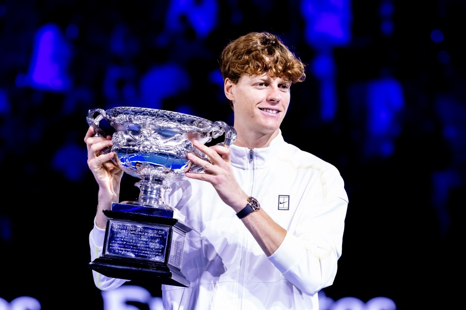 MELBOURNE, VIC - JANUARY 26: Jannik Sinner of italy raises the Norman Brookes Challenge Cup after winning the Men's Singles Final of the 2025 Australian Open on January 26 2025, at Melbourne Park in Melbourne, Australia. (Photo by Jason Heidrich/Icon Sportswire via Getty Images)