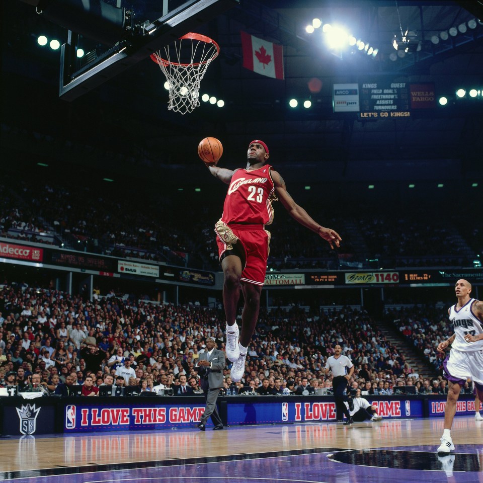 SACRAMENTO, CA - OCTOBER 29:  LeBron James #23 of the Cleveland Cavaliers goes for a dunk against the Sacramento Kings during the NBA game at the Arco Arena on October 29, 2003 in Sacramento, California.  NOTE TO USER: User expressly acknowledges  and agrees that, by downloading and or using this  photograph, User is consenting to the terms and conditions of the Getty Images License Agreement. Mandatory copyright notice: Copyright NBAE 2003 (Photo by Rocky Widner/ NBAE via Getty Images)