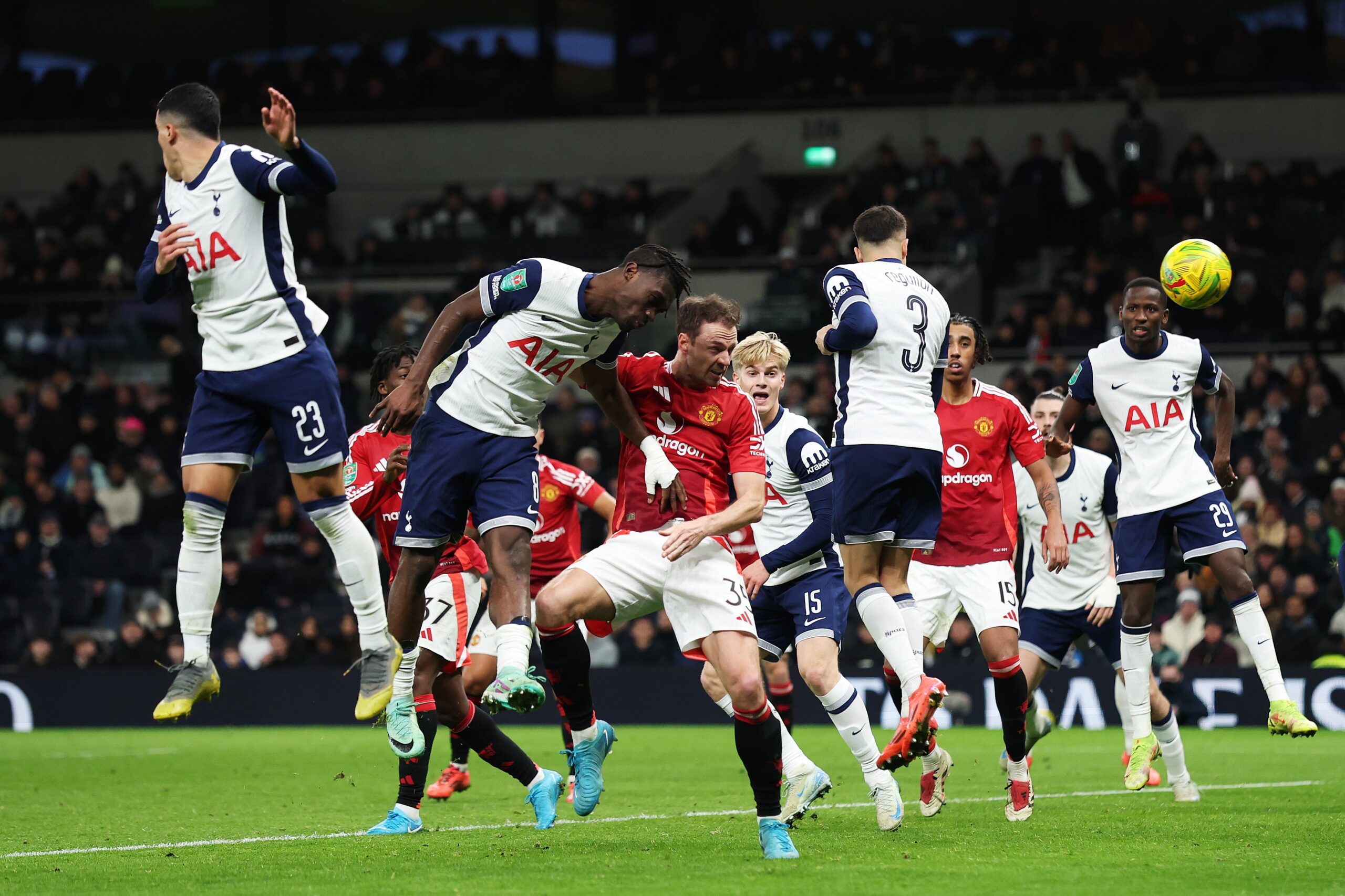 Jonny Evans of Manchester United scores against Tottenham