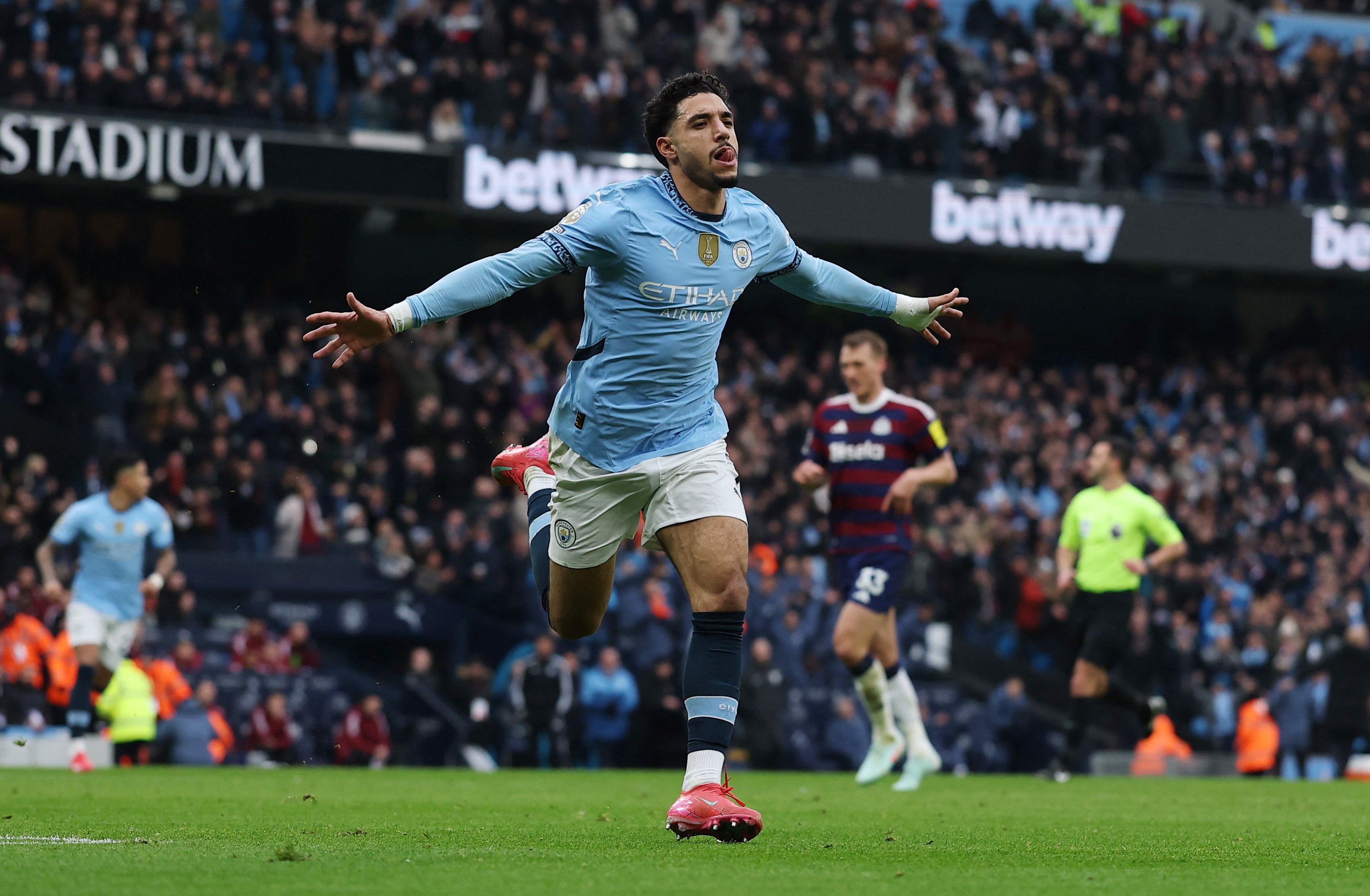 Omar Marmoush celebrates after putting City in front