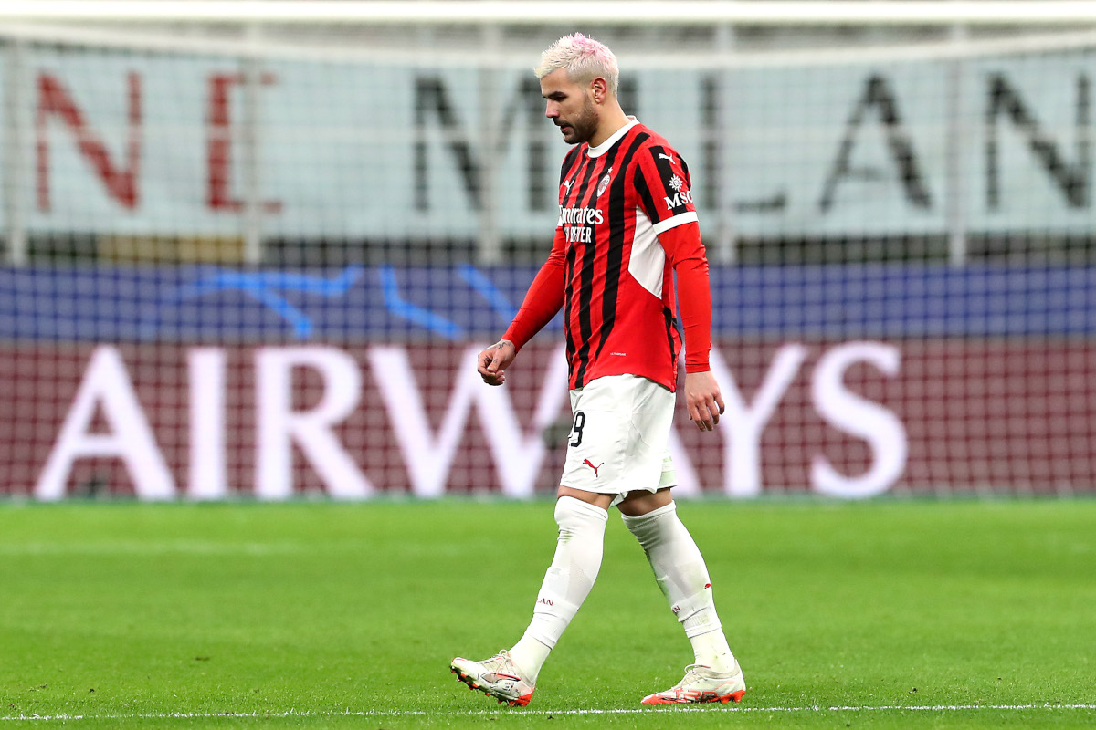 MILAN, ITALY - FEBRUARY 18: Theo Hernandez of AC Milan leaves the pitch after receiving a red card for diving during the UEFA Champions League 2024/25 League Knockout Play-off second leg match between AC Milan and Feyenoord at San Siro Stadium on February 18, 2025 in Milan, Italy. (Photo by Marco Luzzani/Getty Images)