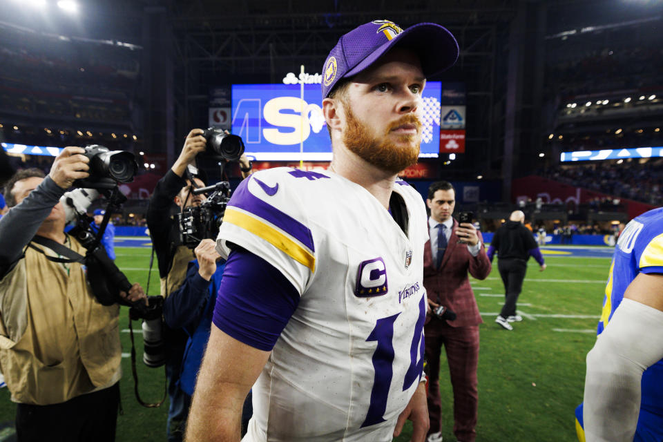 GLENDALE, ARIZONA - JANUARY 13: Sam Darnold #14 of the Minnesota Vikings walks off the field after the NFC Wild Card Playoff game against the Los Angeles Rams at State Farm Stadium on January 13, 2025 in Glendale, Arizona. (Photo by Ric Tapia/Getty Images)