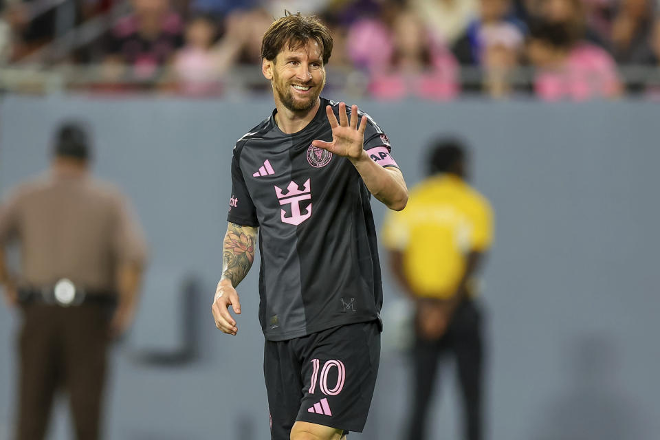 Lionel Messi of Inter Miami FC acknowledges a save during the second half of a preseason MLS soccer match against Orlando City on Friday, Feb. 14, 2025, in Tampa, Fla. (AP Photo/Mike Carlson)