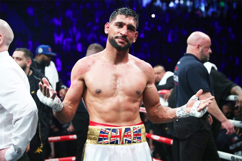 Amir Khan in boxing ring, shirtless, wearing boxing shorts.