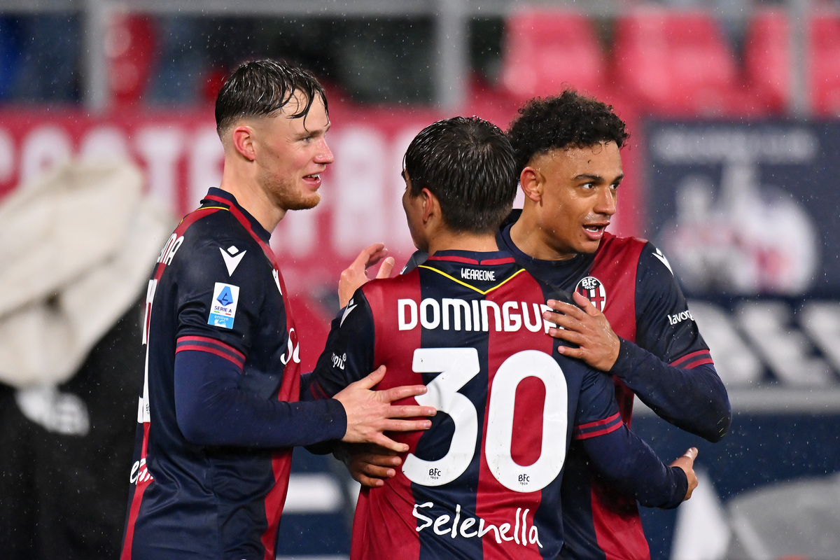 Dan Ndoye of Bologna (R) celebrates scoring his team's first goal with teammates Sam Beukema (L) and Benjamin Dominguez the Serie A match between Bologna and Torino at Stadio Renato Dall'Ara on February 14, 2025 in Bologna, Italy. (Photo by Alessandro Sabattini/Getty Images)