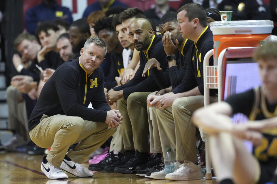 Michigan head coach Dusty May reacts to play during the first half of an NCAA college basketball game against Indiana, Saturday, Feb. 8, 2025, in Bloomington, Ind. (AP Photo/Kareem Elgazzar)