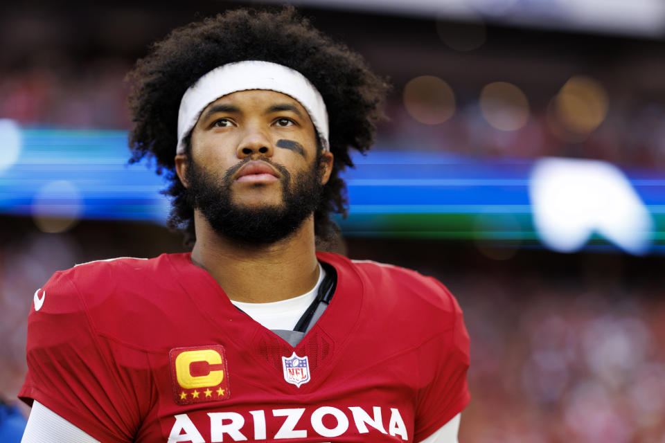 GLENDALE, ARIZONA - JANUARY 5: Quarterback Kyler Murray #1 of the Arizona Cardinals stands on the sidelines during the national anthem prior to an NFL football game against the San Francisco 49ers at State Farm Stadium on January 5, 2025 in Glendale, Arizona. (Photo by Brooke Sutton/Getty Images)