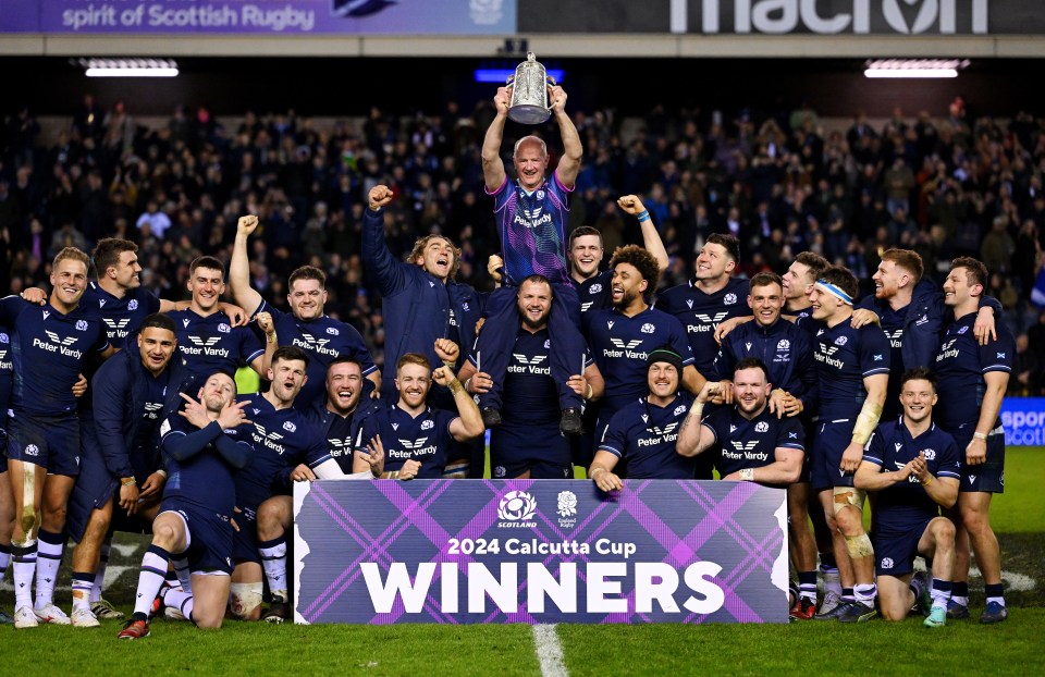 Scotland rugby team celebrating Calcutta Cup victory.