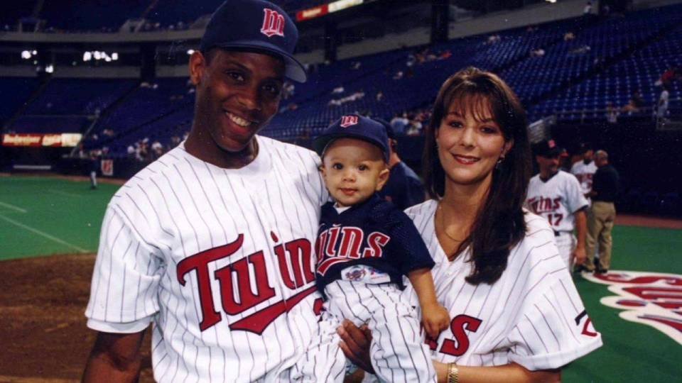 Pat Mahomes with a young Patrick in a Twins uniform