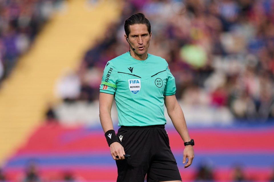 Jose Luis Munuera Montero, a FIFA referee, at a soccer match.