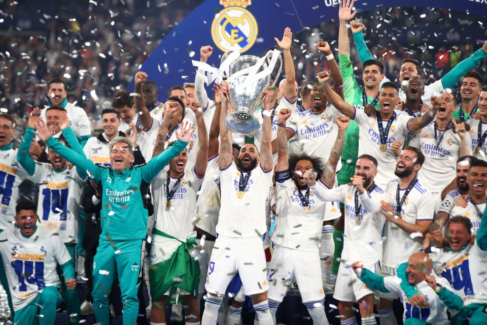 Real Madrid players celebrating their UEFA Champions League victory.