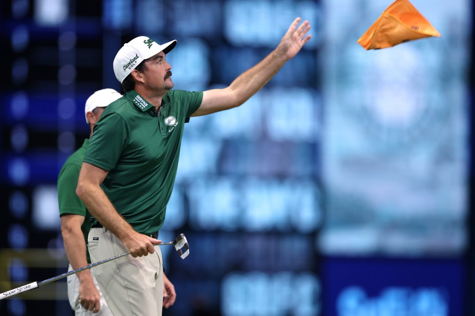 Keegan Bradley of Boston Common Golf throwing a flag during a golf match.