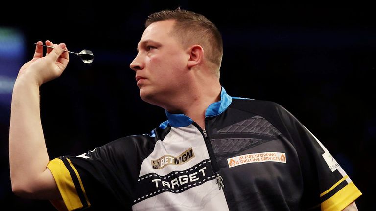 Chris Dobey in action during his match against Gerwyn Price on night one of the 2025 BetMGM Premier League at the SSE Arena, Belfast.