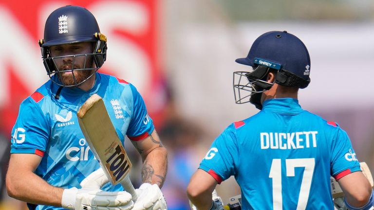 England's Phil Salt, left, and Ben Duckett run between the wickets to score during the first one day international cricket match between India and England at Vidarbha Stadium in Nagpur, India, Thursday, Feb. 6, 2025. (AP Photo/Aijaz Rahi) 