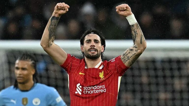 Dominik Szoboszlai celebrates after doubling Liverpool's lead at the Etihad