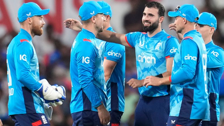 England's Saqib Mahmood, third right, celebrates with teammates after the dismissal of India's captain Rohit Sharma during the first one day international cricket match between India and England at Vidarbha Stadium in Nagpur, India, Thursday, Feb. 6, 2025. (AP Photo/Aijaz Rahi)