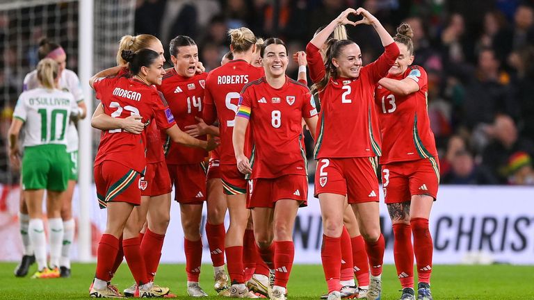 Wales , United Kingdom - 29 November 2024; Lily Woodham of Wales, centre, celebrates after scoring her side's first goal during the UEFA Women's EURO 2025 Play-off Round Two first leg match between Wales and Republic of Ireland at Cardiff City Stadium in Wales. (Photo By Stephen McCarthy/Sportsfile via Getty Images)