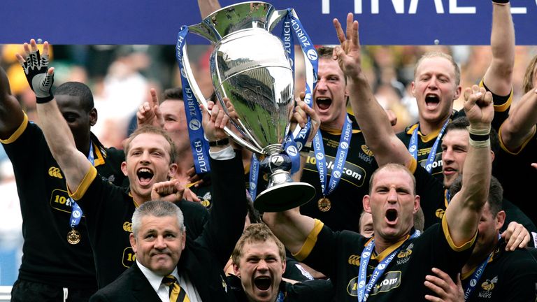 Wasps' coach Warren Gatland (front left) and captain Lawrence Dallaglio (front right) lift the Premiership trophy in 2005