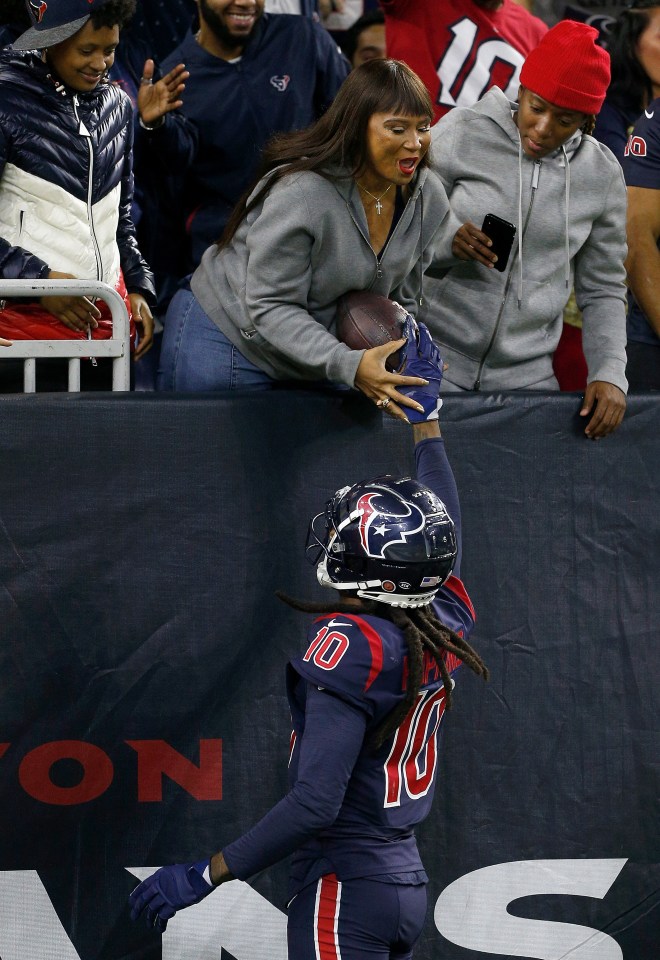 D-Hop loves to hand his touchdowns to his mom in the stands