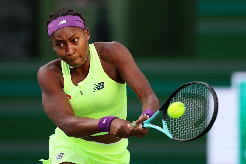 INDIAN WELLS, CALIFORNIA - MARCH 14:  Coco Gauff of the United States serves against Yue Yuan of China in their Quarterfinal match during the BNP Paribas Open at Indian Wells Tennis Garden on March 14, 2024 in Indian Wells, California. (Photo by Clive Brunskill/Getty Images)