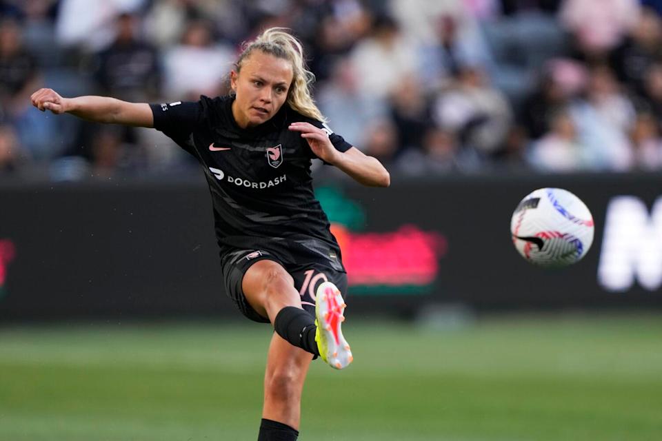 Angel City's Claire Emslie passes the ball during a 2024 Game against Bay FC