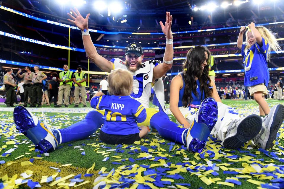 Rams receiver Cooper Kupp celebrates with his family after winning the MVP of Super Bowl LVI.